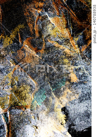 Shiny abstract metallic gold bronze and silver paint on a black background texture Shiny abstract metallic gold bronze and silver paint on a black background texture 140788938