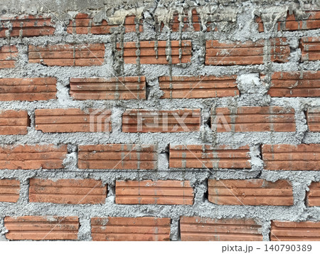 Brick wall, red brick, mortar, rough texture, construction material pattern Brick wall, red brick, mortar, rough texture, construction material pattern 140790389