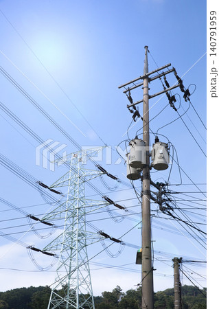 Transmission towers and utility poles Transmission towers and utility poles 140791959