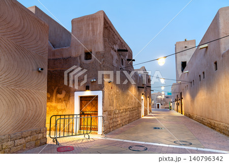 A beautifully lit traditional clay and mud brick alleyway in the historic Al Doho district of Riyadh, Saudi Arabia at dusk A beautifully lit traditional clay and mud brick alleyway in the historic Al Doho district of Riyadh, Saudi Arabia at dusk 140796342