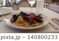 イタリア旅行で食べた本場の美味しそうなパスタ（トマトソースとムール貝のスパゲッティ） 140800233