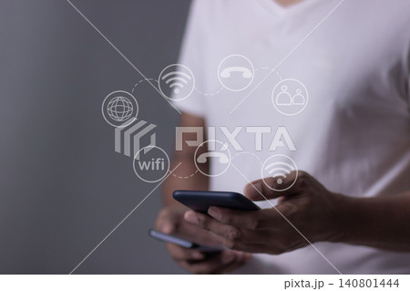 Young man hand using smartphone with to Interconnect, 140801444