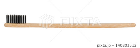 Bamboo toothbrush with black bristles isolated on white background Bamboo toothbrush with black bristles isolated on white background 140803312