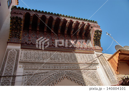 The intricate carved wooden ceiling crowns the west portal of the historic Great Mosque of Meknes The intricate carved wooden ceiling crowns the west portal of the historic Great Mosque of Meknes 140804101