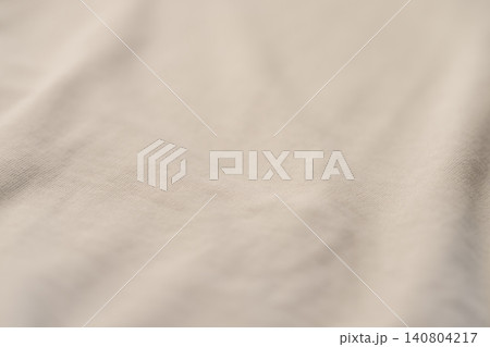 Closeup of beige french terry fabric for hoodies and similar clothes Closeup of beige french terry fabric for hoodies and similar clothes 140804217
