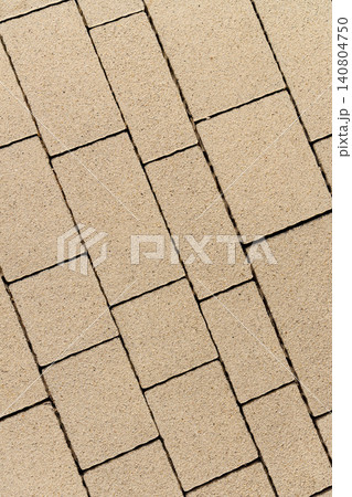 Tile texture on a pedestrian sidewalk with geometric pattern Tile texture on a pedestrian sidewalk with geometric pattern 140804750