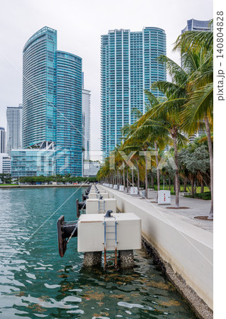 Modern skyline of Miami with towering skyscrapers, tropical vibe, and waterfront views Modern skyline of Miami with towering skyscrapers, tropical vibe, and waterfront views 140804828