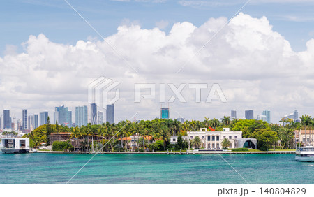 Modern skyline of Miami with towering skyscrapers, tropical vibe, and waterfront views Modern skyline of Miami with towering skyscrapers, tropical vibe, and waterfront views 140804829