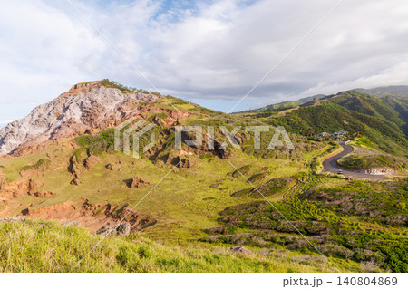 Lush Hawaiian landscape with hills and sky Lush Hawaiian landscape with hills and sky 140804869