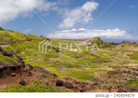 Lush Hawaiian landscape with hills and sky Lush Hawaiian landscape with hills and sky 140804879