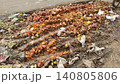 Rotten vegetables and fruits piled beside road in Karachi market 140805806