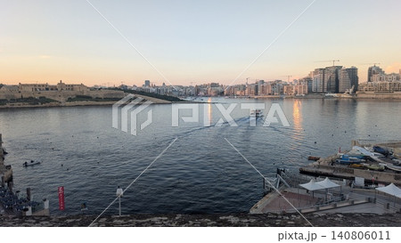 Panoramic view of the port of Valletta in the evening Panoramic view of the port of Valletta in the evening 140806011