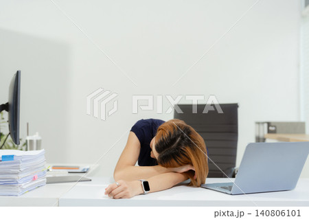 Serious businesswoman concentrating on his paper work at the table at office. Serious businesswoman concentrating on his paper work at the table at office. 140806101