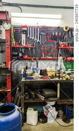 busy workbench with various hand tools, wrenches, busy workbench with various hand tools, wrenches, 140807739