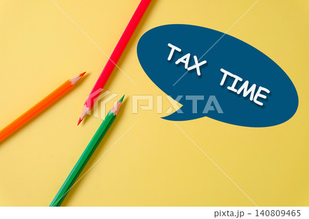 Color pencils with message Tax time on color background. 140809465