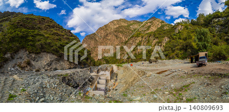 Small hydroelectric power plant construction in mountain valley Small hydroelectric power plant construction in mountain valley 140809693