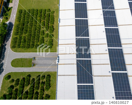 Roof of an industrial building with solar panels on the roof Roof of an industrial building with solar panels on the roof 140810027
