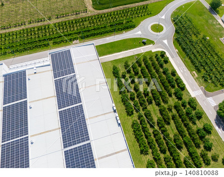 Roof of an industrial building with solar panels on the roof Roof of an industrial building with solar panels on the roof 140810088