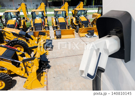 Electric construction machines with charging station. Concept. Electric construction machines with charging station. Concept. 140810145