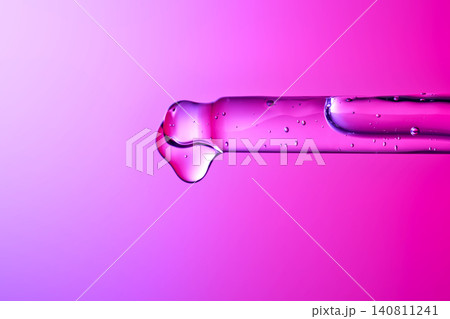 Skincare serum dropper dispensing pink liquid for healthy aging Skincare serum dropper dispensing pink liquid for healthy aging 140811241