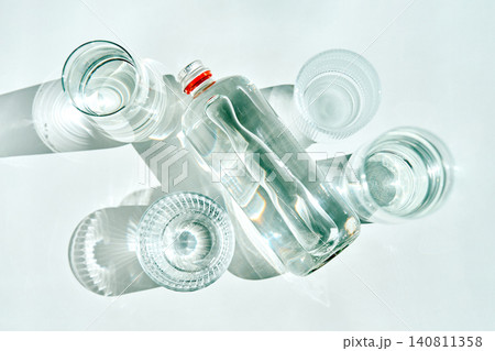 Clean water bottle and glasses for hydration 140811358