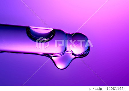 Longevity skincare serum drop falling from pipette Longevity skincare serum drop falling from pipette 140811424