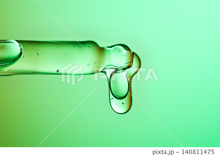 Pipette dispensing clear serum for microbiome skincare innovation 140811475