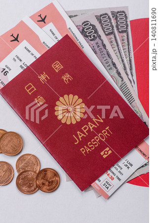 Japanese passport or id document with tickets for flight, travel, border crossing. Japan passport 140811690