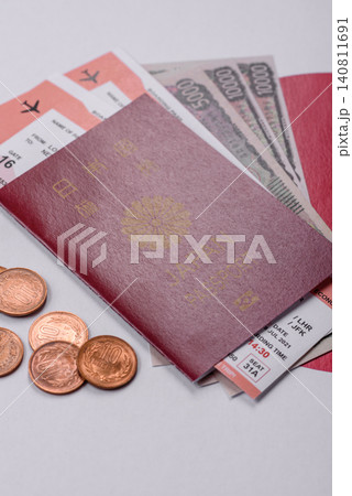 Japanese passport or id document with tickets for flight, travel, border crossing. Japan passport Japanese passport or id document with tickets for flight, travel, border crossing. Japan passport 140811691