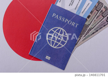 Japanese passport or id document with tickets for flight, travel, border crossing. Japan passport Japanese passport or id document with tickets for flight, travel, border crossing. Japan passport 140811701
