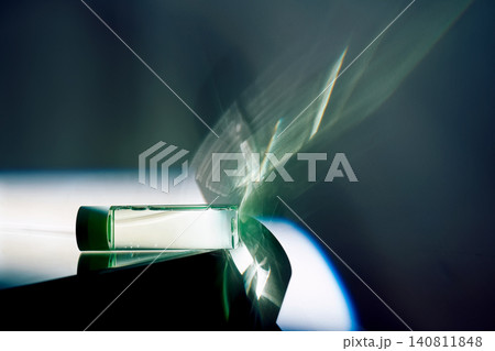 Cosmetic serum flask creating light refraction science Cosmetic serum flask creating light refraction science 140811848