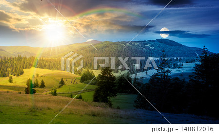 mountainous countryside landscape in summer. day meet night. sun and moon over view of green rural scenery with grassy pastures and rolling forested hills. wonderful mountain weather with cloudy sky mountainous countryside landscape in summer. day meet night. sun and moon over view of green rural scenery with grassy pastures and rolling forested hills. wonderful mountain weather with cloudy sky 140812016