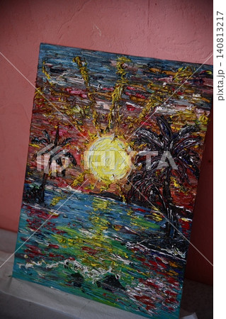 Artist Works on Abstract Oil Painting, Moving Paint Brush Energetically She Creates Modern Masterpiece. Dark Creative Studio where Large Canvas Stands on Easel Illuminated. Low Angle 140813217