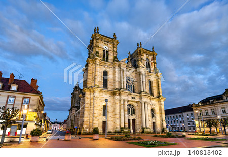 The grand facade and twin towers of the Collegiate Church of Our Lady of the Assumption at twilight in Vitry le Francois, France. The grand facade and twin towers of the Collegiate Church of Our Lady of the Assumption at twilight in Vitry le Francois, France. 140818402