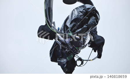 Camera equipment on a production set, showing a protected camera rig, cables, and hardware 140818659