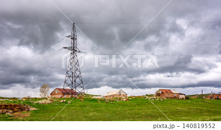 Stormy sky with birds flying above rural scene Stormy sky with birds flying above rural scene 140819552