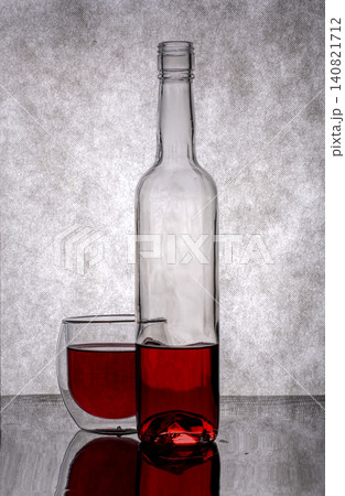 Still life with glassware on a gray background Still life with glassware on a gray background 140821712