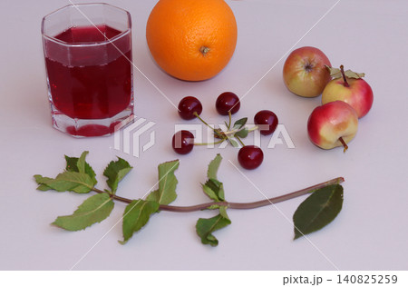 glass of juice and fresh ripe oranges glass of juice and fresh ripe oranges 140825259