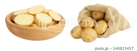 young potato slices in a wooden bowl and bag isolated on white background. Harvest new young potato slices in a wooden bowl and bag isolated on white background. Harvest new 140825457