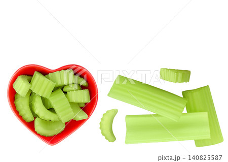 fresh celery in wooden bowl isolated on white background. Top view with copy space for your text. Flat lay 140825587