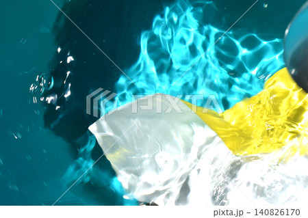 Splashes on the surface of the water illuminated by sunlight. Splashes on the surface of the water illuminated by sunlight. 140826170