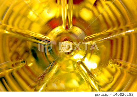Abstract texture created with yellow liquid and container. Abstract texture created with yellow liquid and container. 140826182