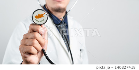 Cyprus healthcare system, Cypriot national healthcare concept. Hand of doctor holding stethoscope 140827419