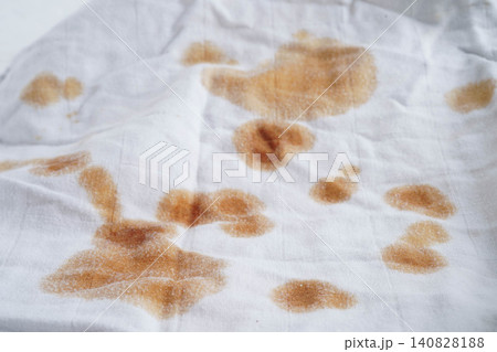 Dirty tomato sauce stain removal or ketchup on cloth accident to wash with washing powder, cleaning housework. Dirty tomato sauce stain removal or ketchup on cloth accident to wash with washing powder, cleaning housework. 140828188