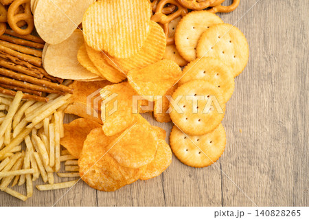Mix of variety snack chips pretzel and cracker, junk crunchy food. Mix of variety snack chips pretzel and cracker, junk crunchy food. 140828265