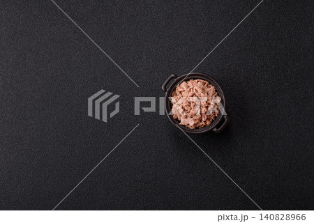 Fish, canned tuna chunks in brine for sandwiches and salads. Canned tuna Fish, canned tuna chunks in brine for sandwiches and salads. Canned tuna 140828966