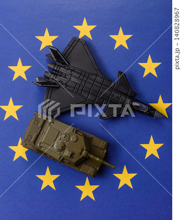 A fighter jet on the European Union flag as a conceptual backdrop representing Europe's defense A fighter jet on the European Union flag as a conceptual backdrop representing Europe's defense 140828967