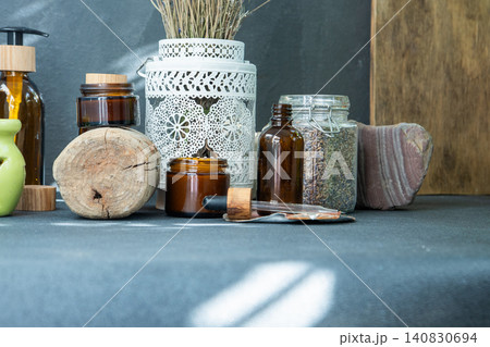 Scented candles and jars with essential oil. Dried lavender. Aromatherapy Scented candles and jars with essential oil. Dried lavender. Aromatherapy 140830694
