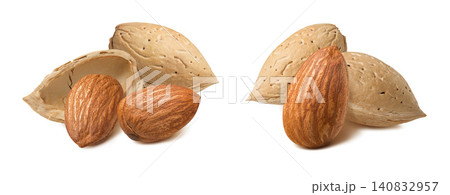 Set of almond nuts in shell isolated on white background. Real photography Set of almond nuts in shell isolated on white background. Real photography 140832957