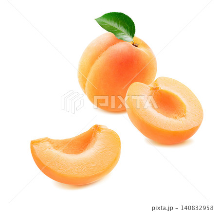 Whole apricot and pieces isolated on white background. Real photography Whole apricot and pieces isolated on white background. Real photography 140832958